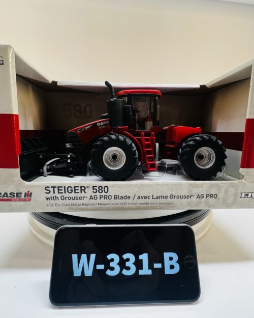 Steiger 580 with Grouser Ag Pro Blade